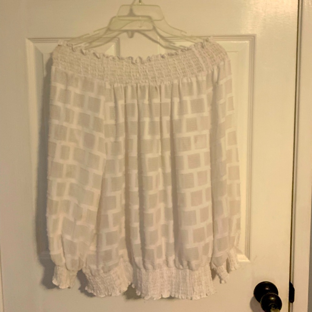 Off the shoulder day or night blouse.